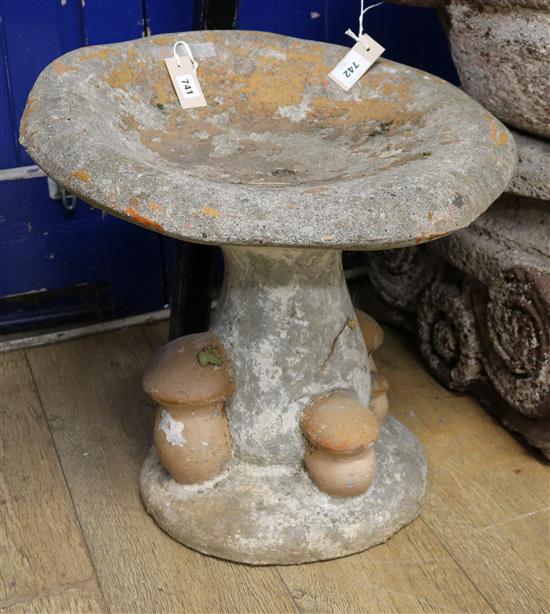 A concrete mushroom W.55cm